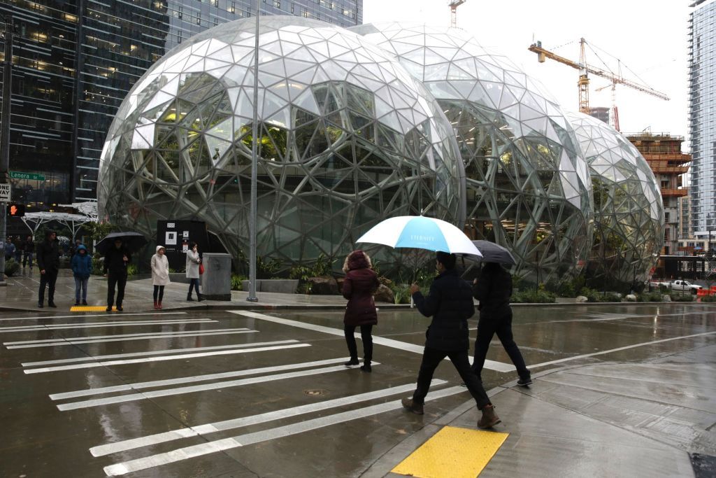 Seattle approves a scaled-down tax over Amazon&amp;#039;s objections.