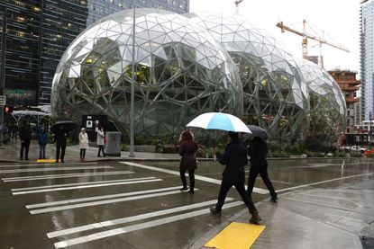 Seattle approves a scaled-down tax over Amazon's objections.