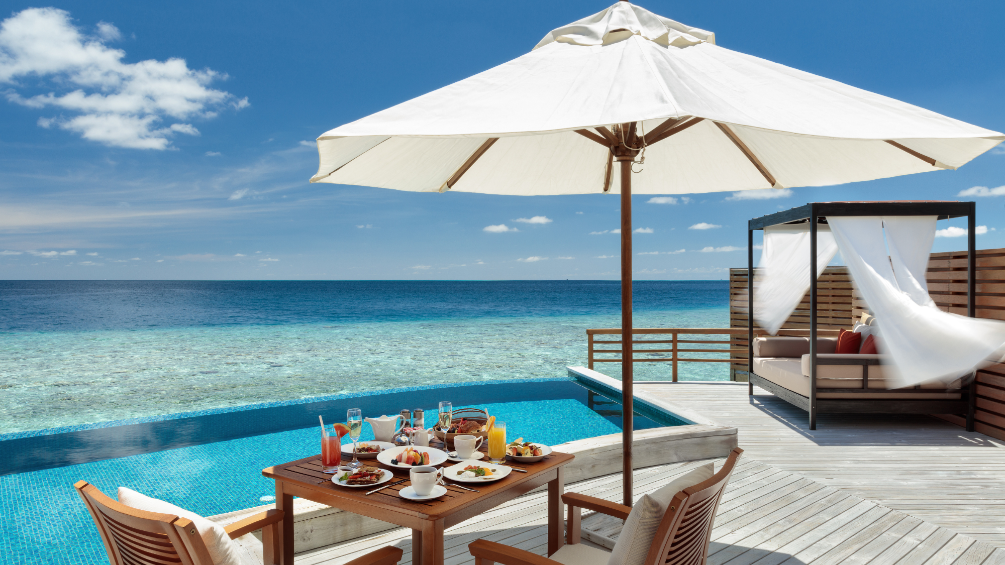 Baros Maldives outdoor terrace in the sun