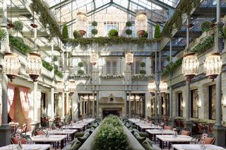The light filled dining room inside the atrium at The Nomad London
