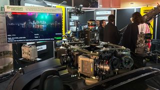 A monitor and a 360-degree camera rig on top of a car on the brownian booth at BSC