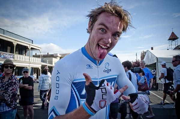 Hangin' for some gold: Race winner Scott Law plays it up for the camera after his gold medal ride.