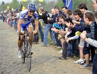 Tom Boonen (Quick Step) gets encouragement from the rabid Flemish fans on the Carrefour de l'Arbre sector.