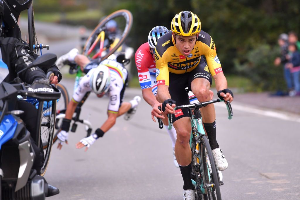 OUDENAARDE BELGIUM OCTOBER 18 Julian Alaphilippe of France and Team Deceuninck QuickStep World Champion Jersey Wout Van Aert of Belgium and Team Team Jumbo Visma Mathieu Van Der Poel of The Netherlands and Team AlpecinFenix Breakaway Accident Crash Motorbike during the 104th Tour of Flanders 2020 Ronde van Vlaanderen Men Elite a 2433km race from Antwerpen to Oudenaarde RVV20 FlandersClassic on October 18 2020 in Oudenaarde Belgium Photo by Luc ClaessenGetty Images