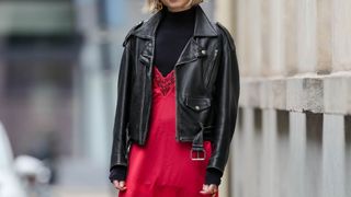 street style person wearing red dress and turtleneck