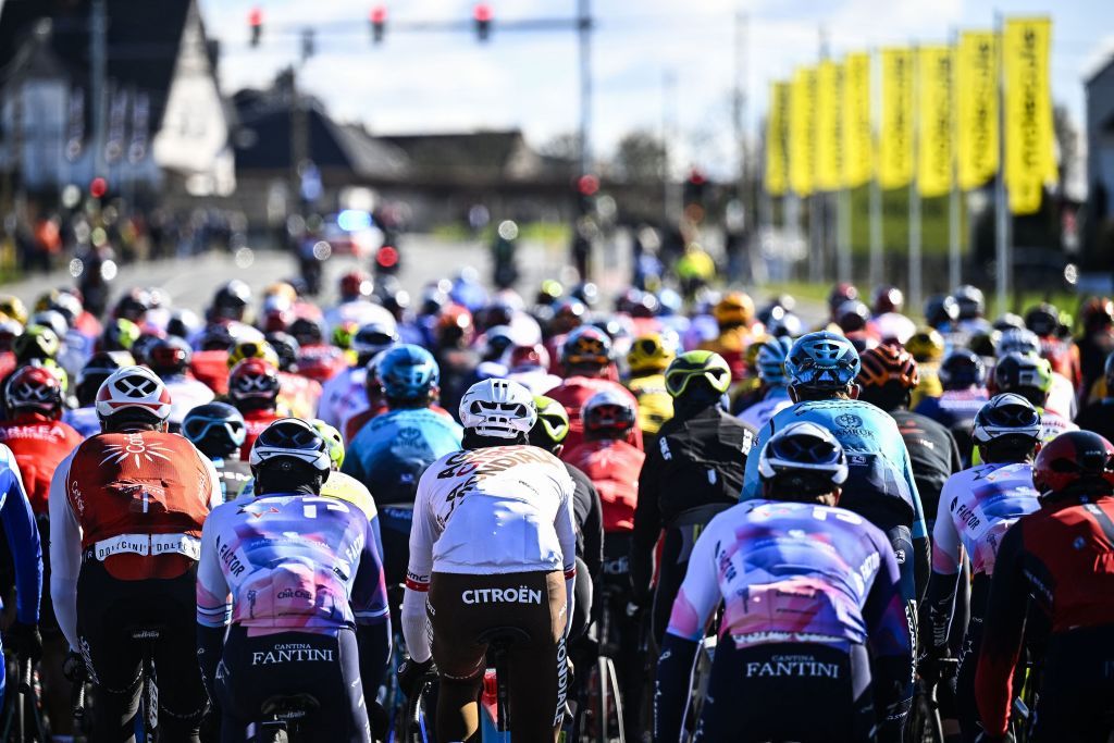 The pack of riders cycles during the KuurneBrusselsKuurne one day cycling race 193 km from Kuurne to Kuurne via Brussels on February 26 2023 Photo by JASPER JACOBS Belga AFP Belgium OUT Photo by JASPER JACOBSBelgaAFP via Getty Images