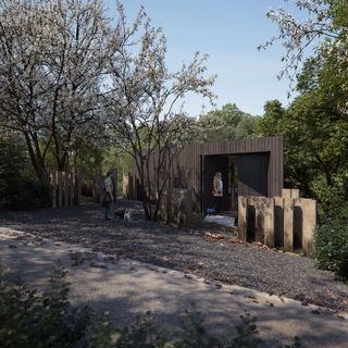 The outside walkway shows an outbuilding which blends into the environment