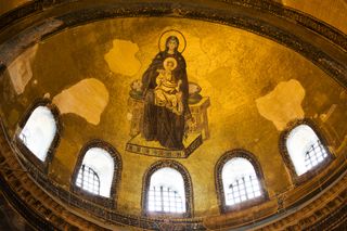 The Apse Mosaic in the Hagia Sophia shows the Virgin Mary holding baby Jesus. It is 13 feet tall.