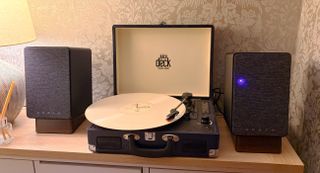 Onkyo GX-30ARC speakers set up with a budget turntable