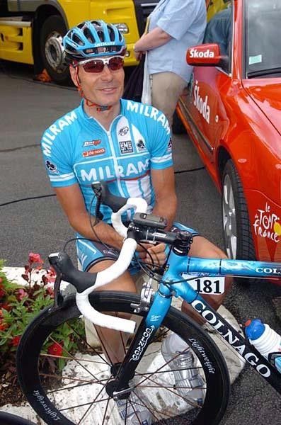 Erik Zabel rests on a flower pot. Cyclists don't like to waste any energy. Now if he only had a kickstand