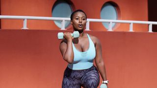 Woman doing a dumbbells workout