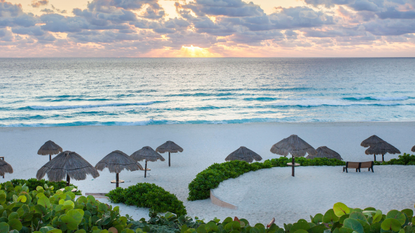 Sunrise over Playa Delfines in Cancun, Mexico