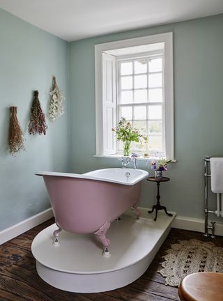 pink roll top slipper bath in a Georgian home