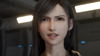 Tifa from Final Fantasy 7 Revelation looks determined at the camera.