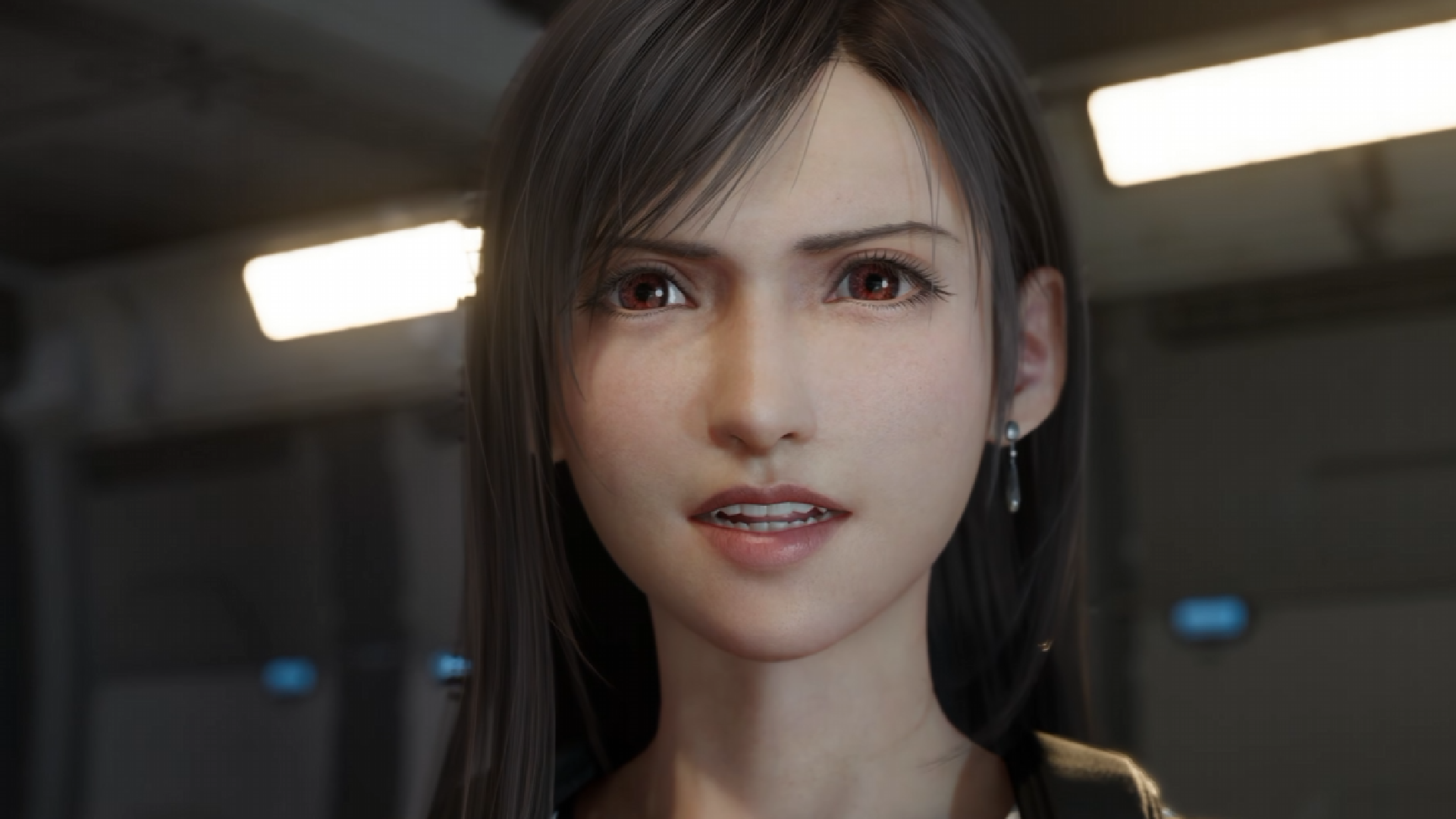 Tifa from Final Fantasy 7 Revelation looks determined at the camera.