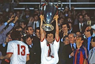 Dejan Savicevic holds aloft the Champions League trophy after AC Milan's 4-0 win over Barcelona in 1994.
