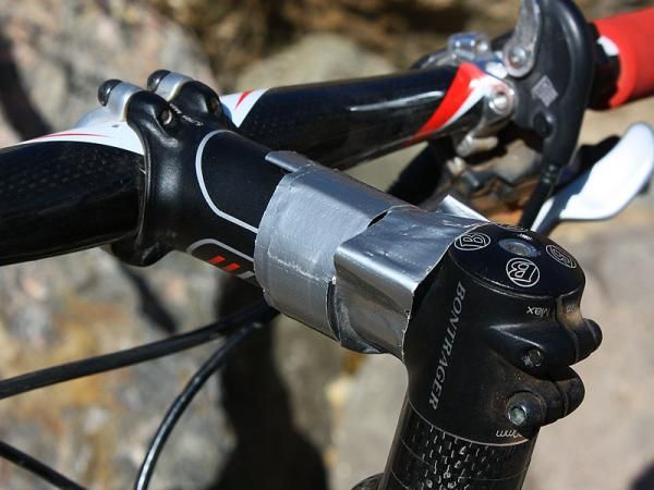 This duct tape isn't left over from holding gel packs. Magelky relied on 'normal' food during the race and the tape helped keep his handlebar lights in place.