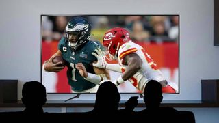 The Philadelphia Eagles playing the Kansas City Chiefs on a big-screen TV.