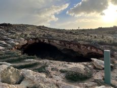 The sinkhole is roughly 40 feet in diameter, or about half the size of a tennis court.