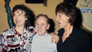 British guitarist and songwriter Jimmy Page with his arm around American guitarist, songwriter, and luthier Les Paul (1915-2009), with British guitarist and songwriter Jeff Beck attending an event, United States, circa 1985. 