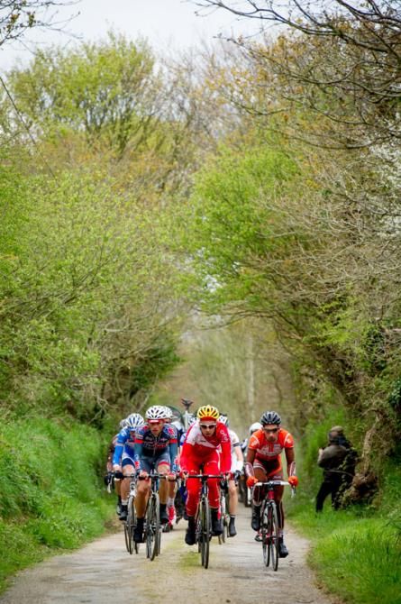 Riders racing on an unpaved roads