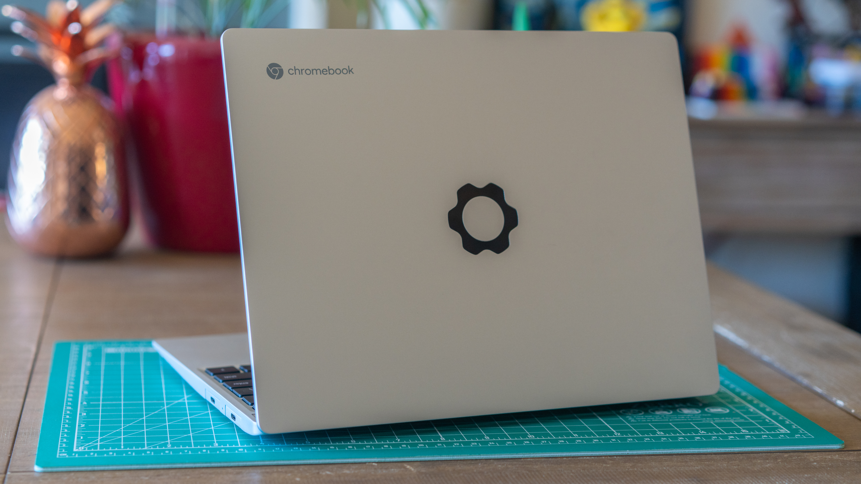 Framework Laptop Chromebook Edition open on a desk, lid facing camera