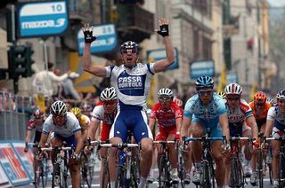 An exultant Alessandro Petacchi sprints to victory in the 2005 Milan-San Remo.