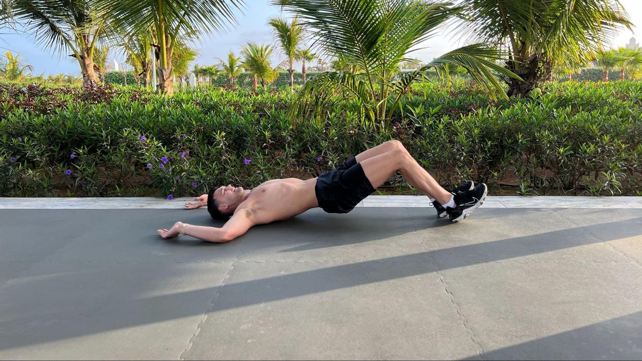Sam Shaw performing a hamstring walk-in