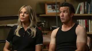 Dee sitting next to Mac in sleeveless tank top with extremely pale shoulders compared to extremely tanned forearms in It's Always Sunny in Philadelphia Season 17