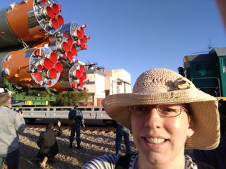 Prior to launch, the Soyuz rocket carrying the spacecraft was put on a railway track and sent to the launchpad on June 4, passing extremely close to journalists. Hence the selfie.