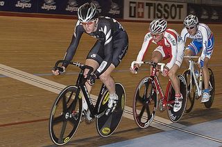 New Zealander Tom Scully (front) heads towards a gold medal in the final of the 15km scratch race.