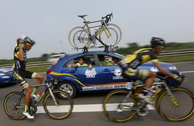Riders fuel up during stage 2 of Tour of Hainan