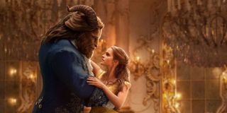 The Beast and Belle embrace as they dance in a promotional image for 'Beauty and the Beast'