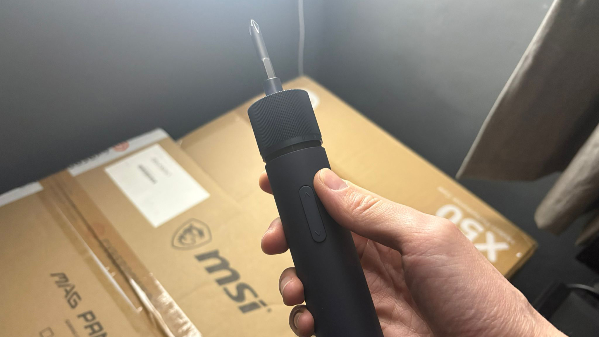 A Hoto screwdriver in hand.