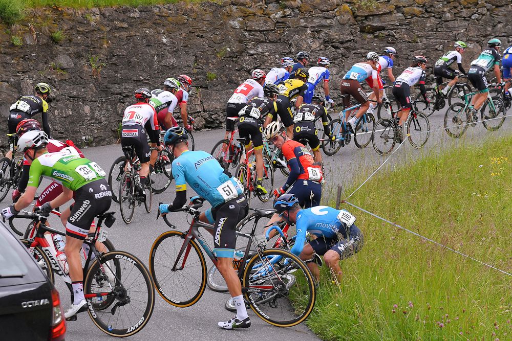 A crash in a corner on one of the climbs during stage 5 at Tour de Suisse