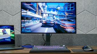 LG UltraGear 27GX790B-B gaming monitor on a desk.