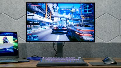 LG UltraGear 27GX790B-B gaming monitor on a desk.