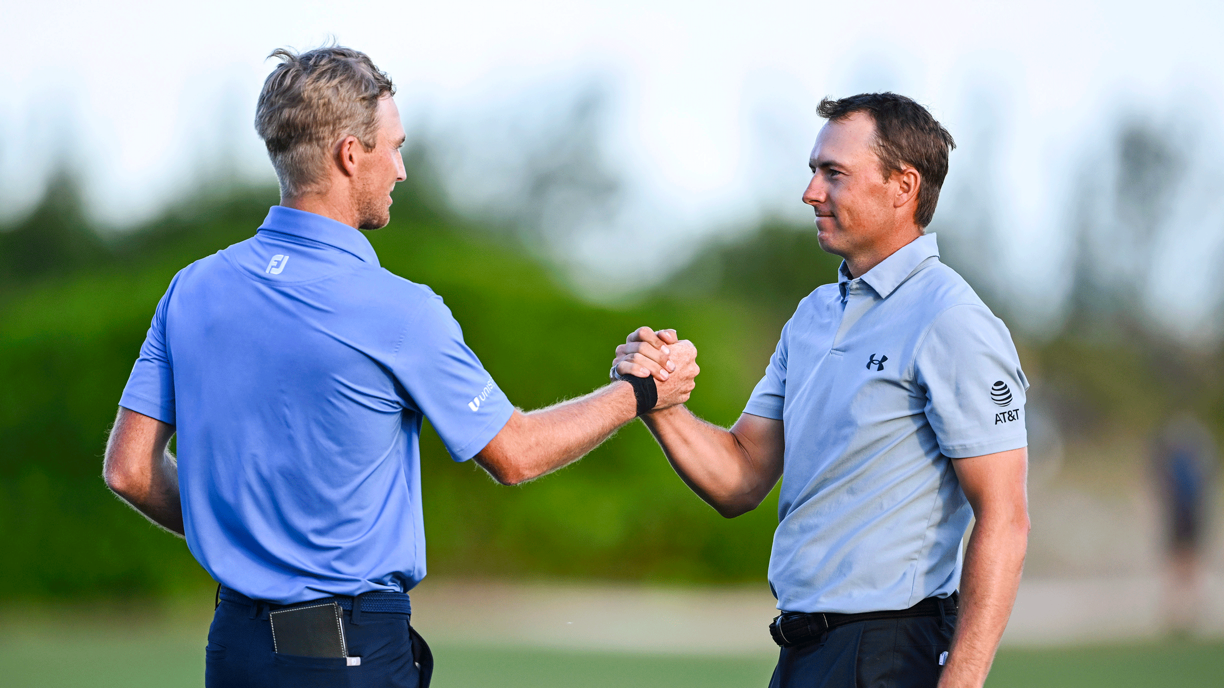 Will Zalatoris (left) and Jordan Spieth shake hands after a round at the 2023 PGA Championship