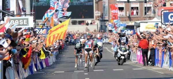The Schlecks trail in behind the victorious Philippe Gilbert.