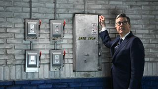 Stephen Colbert grabs the Late Show's power switch during a final season episode of the CBS late night series. 