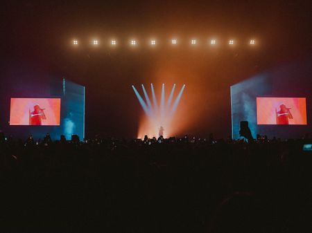 Loyle Carner on stage performing