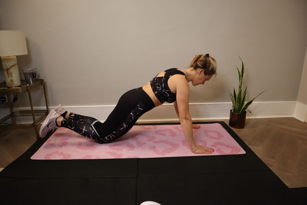LDN Mum's Fitness founder Sarah Campus demonstrating a kneeling push-up