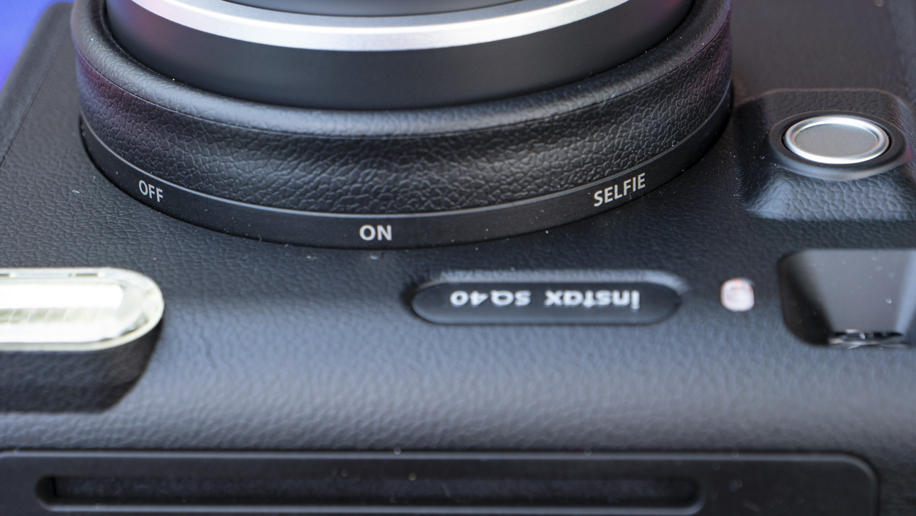 Fujifilm Instax SQ40 camera close up of lens and shooting modes