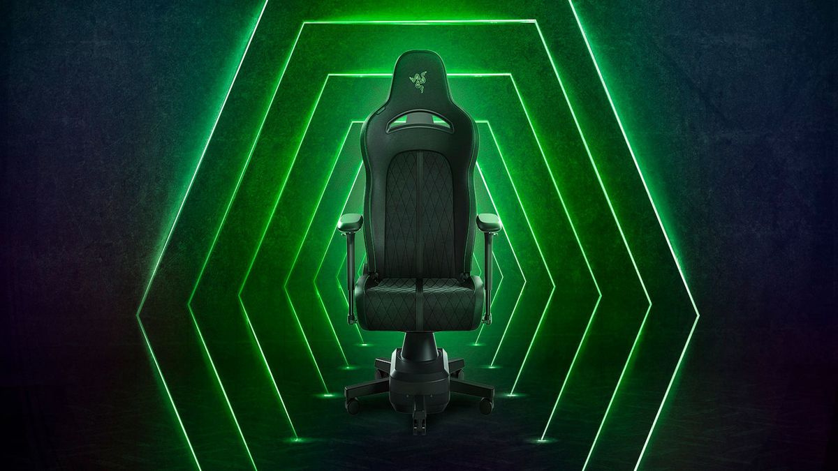 A black gaming chair with a green background