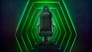 A black gaming chair with a green background