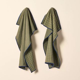 Two checked green kitchen towels