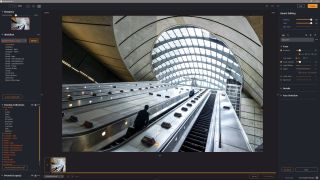 Radiant Photo 2 photo editing software with a picture of a loan person riding up an escalator