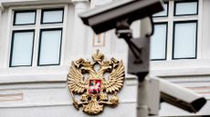 An exterior view of the Russian Embassy in The Hague, Netherlands, with a security camera watching over.