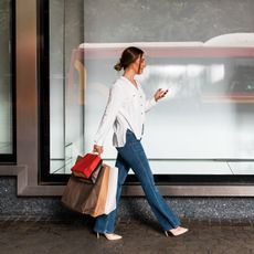 woman carrying shopping bags