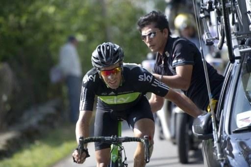Juan Antonio Flecha (Sky) is assisted following his heavy crash.